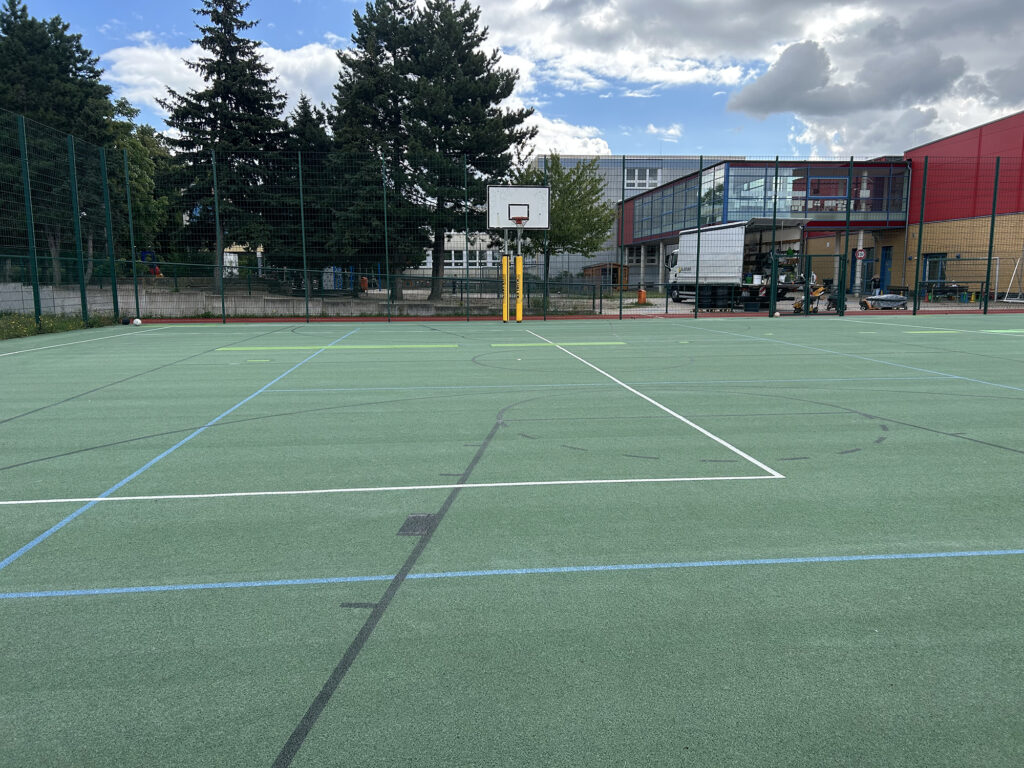 Kunststoffbelag Sportplatz