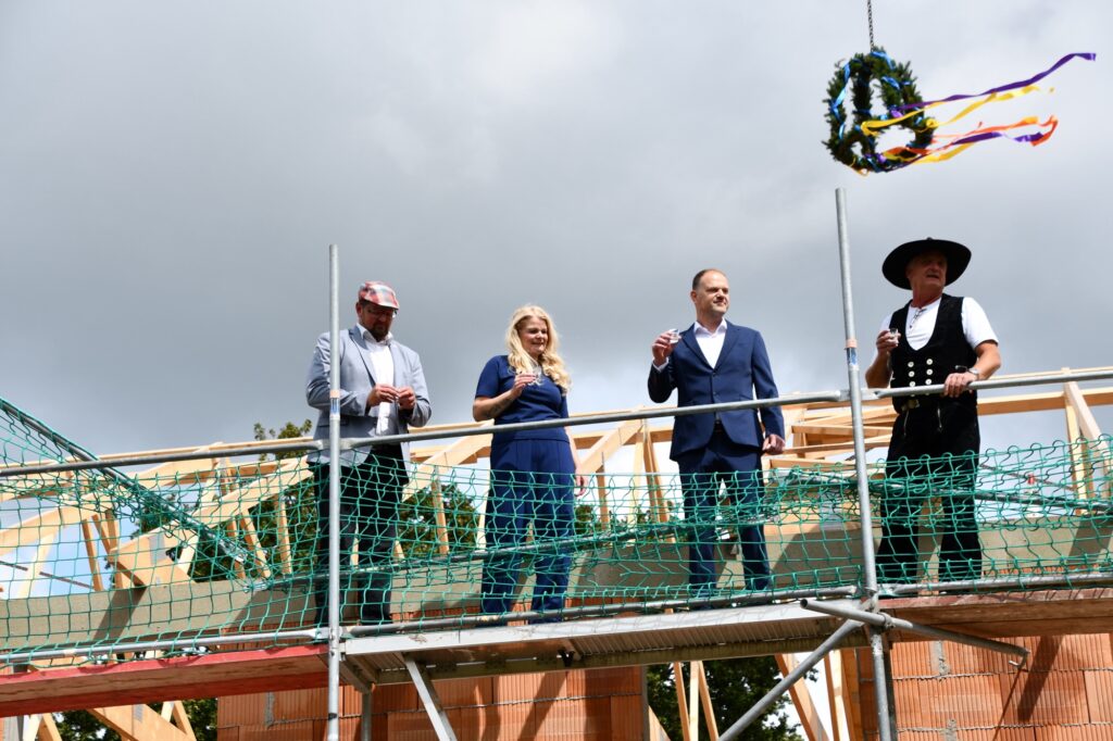 At the topping-out ceremony for the residential quarter