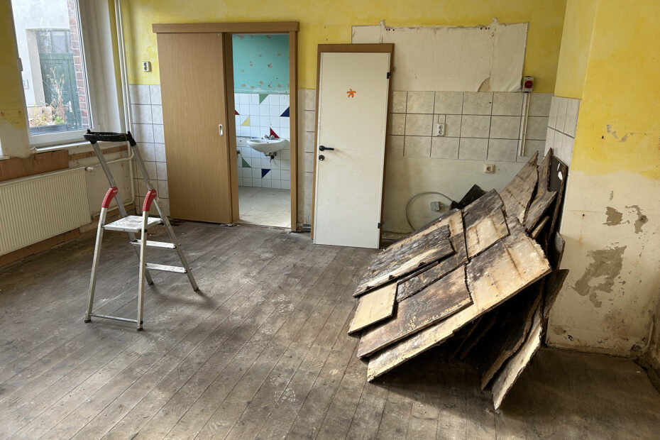 Old wallpaper and old floors were removed