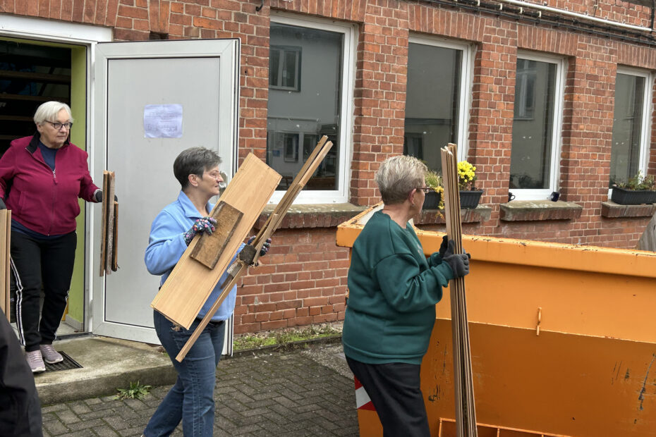 Helpers fill the containers